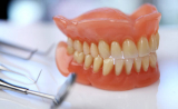Дополнительный зуб